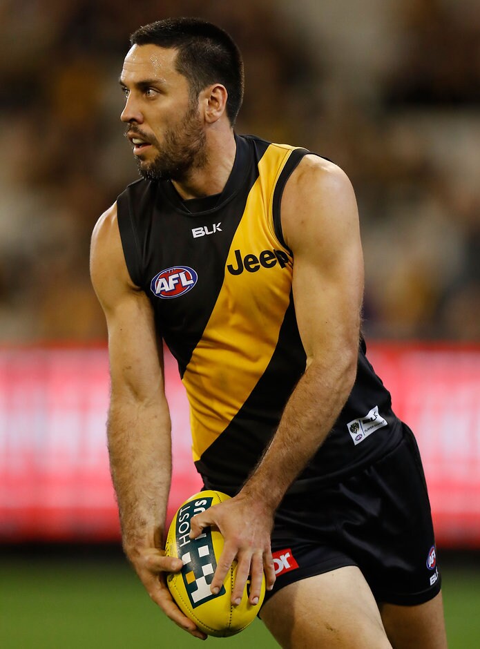 AFL 2016 Rd 07 - Richmond v Hawthorn MELBOURNE, AUSTRALIA - MAY 6: Troy Chaplin of the Tigers in action during the 2016 AFL Round 07 match between the Richmond Tigers and the Hawthorn Hawks at the Melbourne Cricket Ground, Melbourne on May 6, 2016. (Photo by Michael Willson/AFL Media)